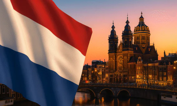 A widescreen 5:3 composite image showing the Dutch flag in the foreground, Amsterdam city skyline with modern office towers and canals at sunset, and translucent Forex candlestick charts overlaid in the sky to represent the Netherlands’ dynamic trading market.
