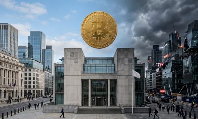A large Bitcoin suspended above a modern financial regulator building, with one side of the surrounding financial district under clear skies and the other beneath dark storm clouds, symbolizing the need for adaptive cryptocurrency regulation across changing market conditions.
